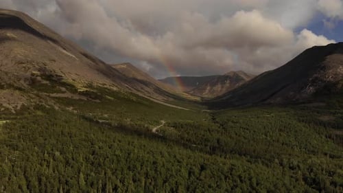 Beautiful Rainbow in the Mountains