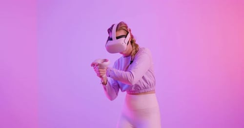 Woman Plays with VR Headset in Studio Setting