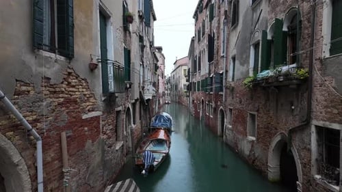 Stunning view of the Venice Canal, the area around the historic buildings,the brown-painted wooden b