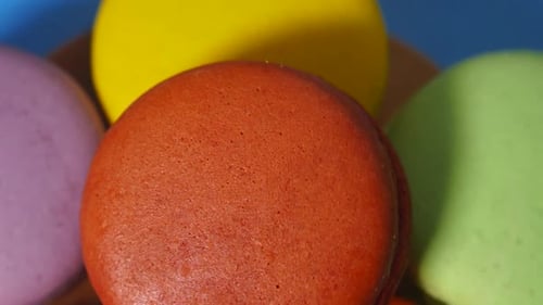 French colorful macarons background close. Colorful French macarons background, Different colorful m