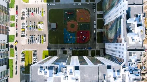 Residential Complex with Playground and Parking Lot Top Down View