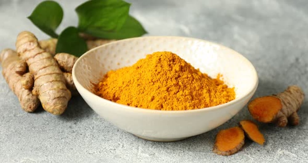 Turmeric Powder and Roots in a Bowl, Food Stock Footage ft. turmeric ...