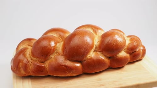 White baton. Sweet white bread. Sweet bread. Close-up.