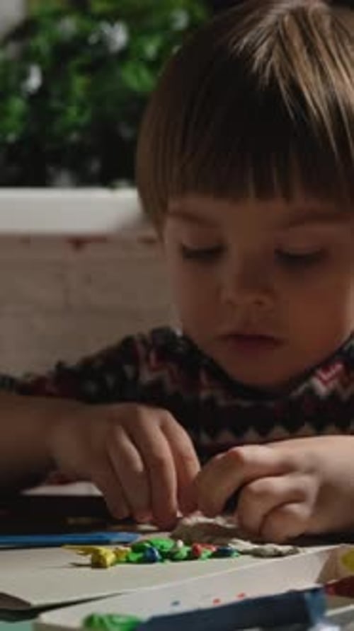 Vertical Video Small Child Making Handmade Christmas Greeting Card