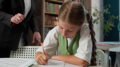 Caucasian Teacher Female Woman Smiling Professor Helping Student Pupil Correcting Mistake Answer