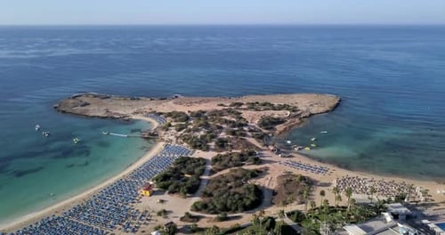 Aerial shot of the seacoast and the beach at a holiday resort. Makronissos beach in Ayia Napa, Cypru