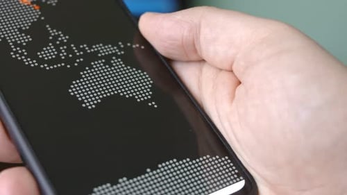 Cyber Attack Map Navigation on Smartphone Displays Show Various Technical Information He's Alone in