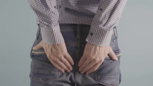 A Man Experiencing Discomfort Due to Painful Haemorrhoids is Evidently in an Unhealthy State