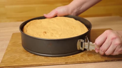 01. The freshly baked cake is removed from the mold. Cooking a festive pie at home