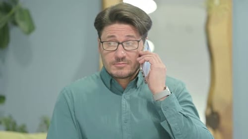 Stylish Man Talking on Mobile Phone Close Up