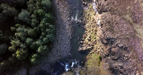 Landscape, nature and river in countryside from drone with natural environment
