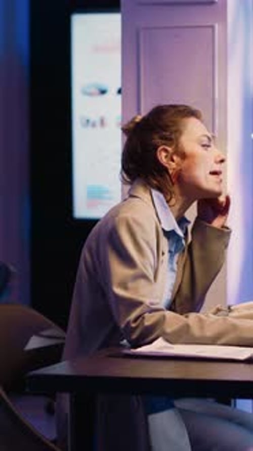 Vertical Video Young Worker Analyzing Documents with Statistics