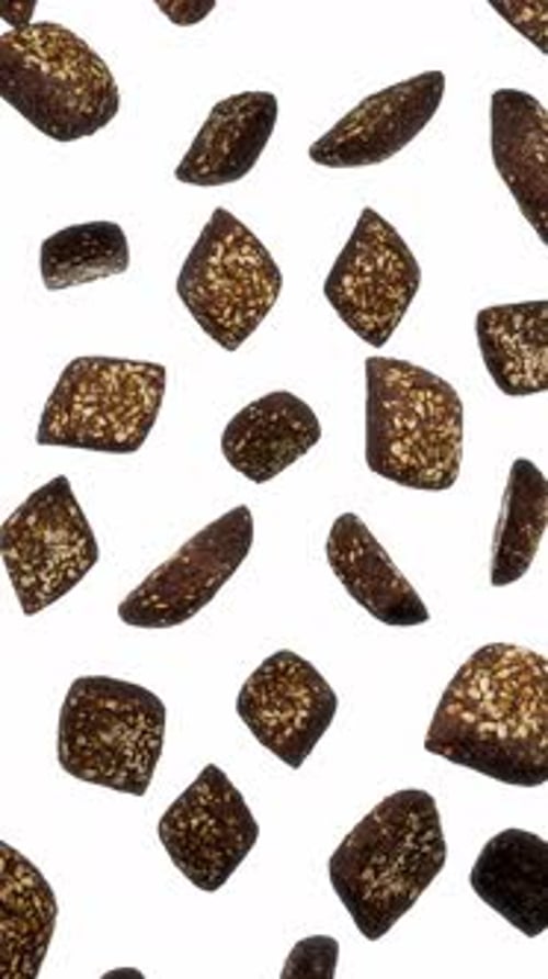 Vertical Floating Black Seed Breads on White