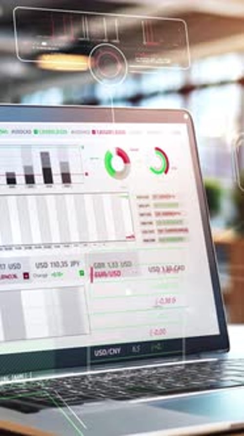 Laptop Showing Trading Platform with Graphs and Exchange Rate in Modern Office
