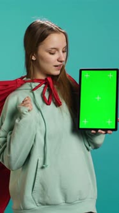 Woman Holds Green Screen Tablet, Explains Product