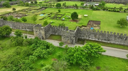 Fortress Walls Along the Green Hillside