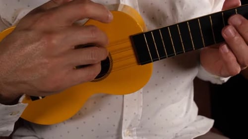 Playing Ukulele Close Up