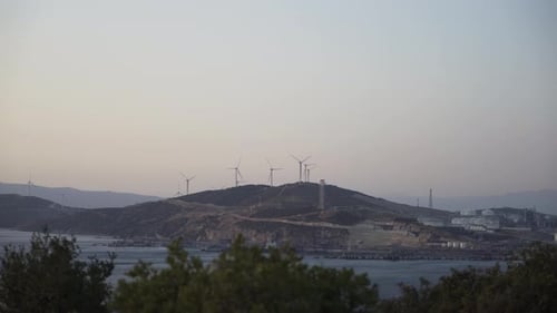 Wind Turbines Near Factories 4K