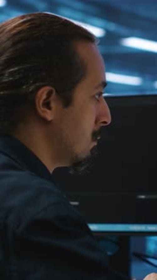 Vertical Video Computer Scientist in Server Hub Doing System Analysis Coding