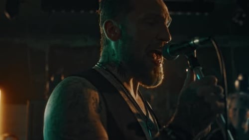Rock Band Performing Live Music on Stage