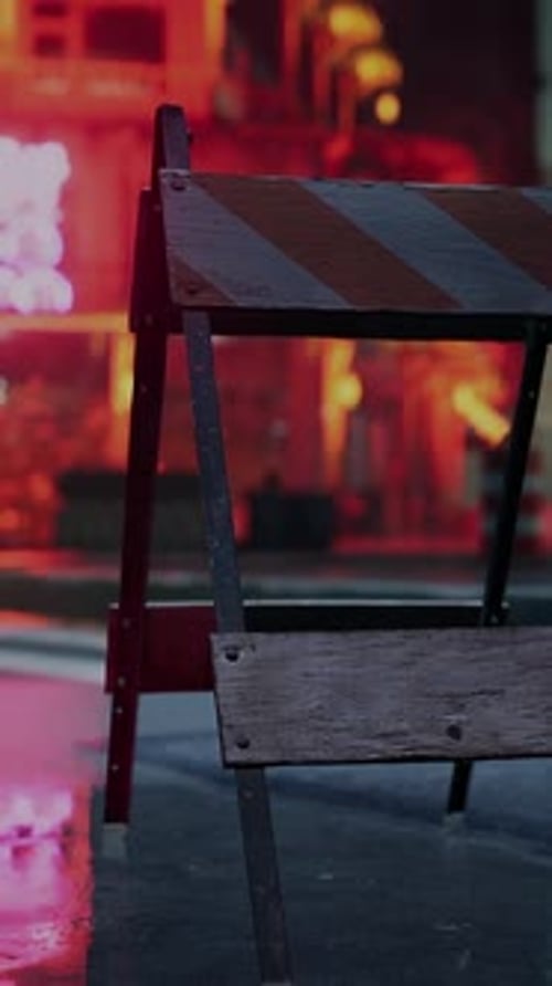 A Construction Sign Sitting on the Side of a Road