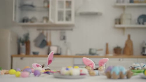 Twin Girls Celebrate Easter Holiday Twins Cheerful Children in Rabbit Bunny Ears Hiding at the Table
