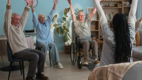 Group Exercise Session for Seniors in Nursing Home
