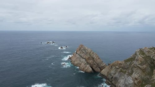 Aerial view of Asturias coastline. Drone shot of sea, cliff, rocks and the Atlantic ocean in Spain.