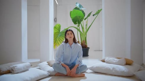 Meditative Woman Looking Camera in Cozy Place Peaceful Woman Sitting Lotus