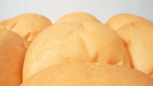 Close Up of a Row of Hamburger Buns