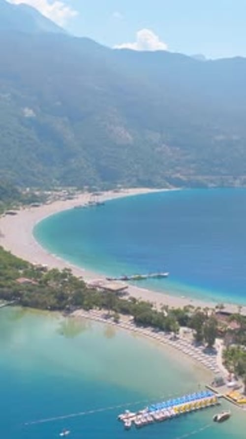 Aerial vertical view of ocean and sandy shore