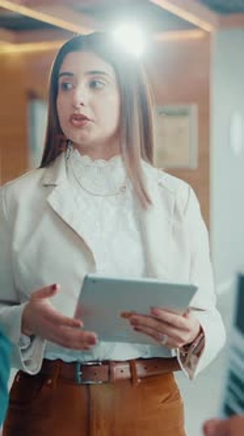 Speaker, tablet and meeting with business woman in office for project update, discussion and review