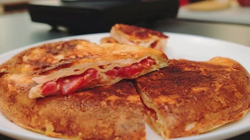 Delicious Pastries with Tomatoes and Cheese on Plate