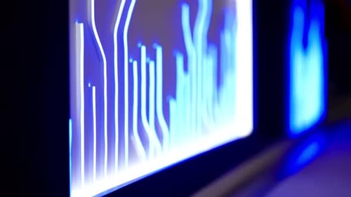Closeup of Glowing Blue Digital Equalizer Bars on a Modern Screen Featuring Abstract Data