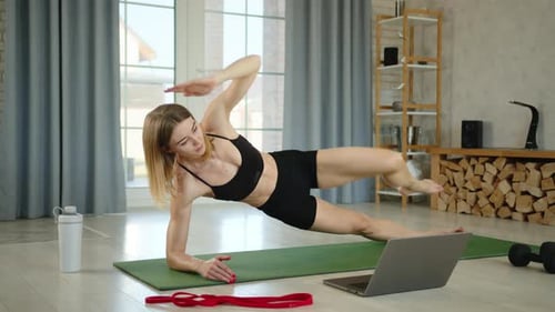 Young Fitness Trainer Conducts Online Training From Home Exercises for Press