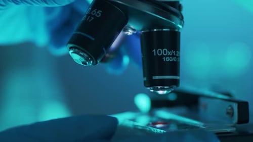 Closeup of Scientific Microscope Laboratory in Hospital Epidemic Disease Healthcare Vaccine Research