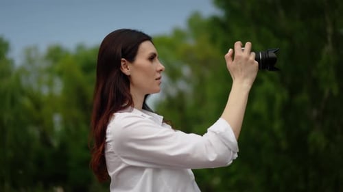 Portrait of Cheerful Beautiful Female in Good Mood with Camera Making Photos of City Happy Pretty