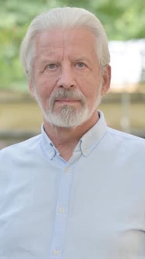 Mature Man with Beard Close Up Portrait