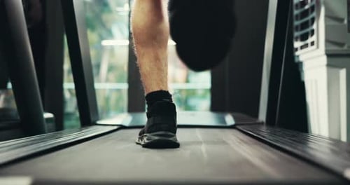 Legs Walk on Treadmill at Indoor Gym