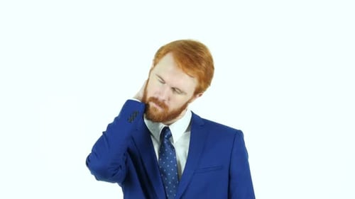 Man in Suit Rubs Neck in Pain