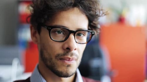 Close-up Portrait of Smiling Young Adult Male