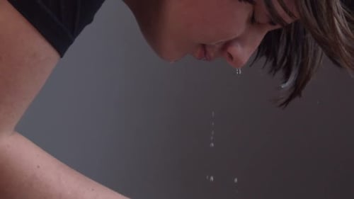 Slow Motion Teen Boy Washes His Face