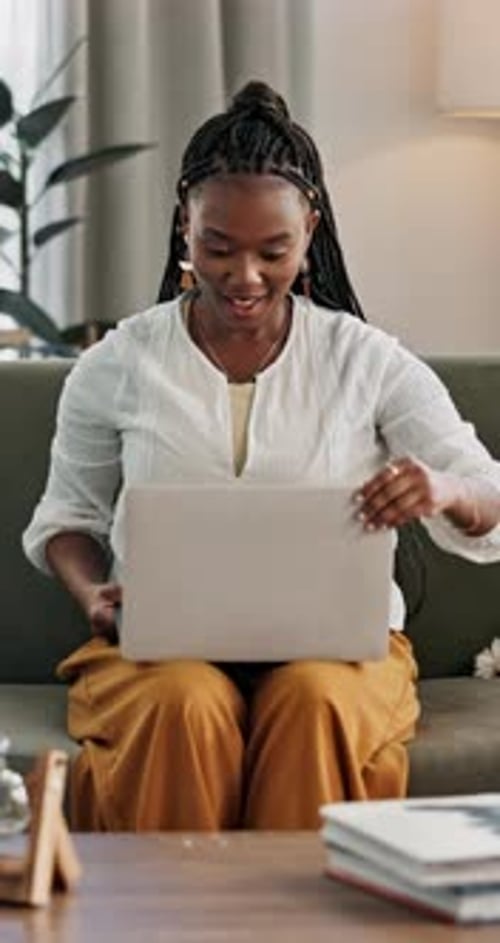 Woman, winner and wow on laptop for home news, financial winning and online competition or giveaway