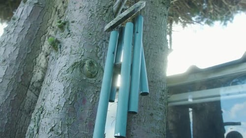 Windchimes blowing in the wind in Garden