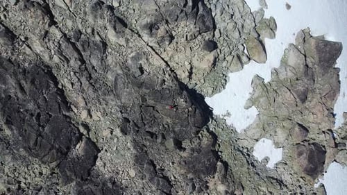 Aerial Drone Top Down Rising on Rocky Sugarloaf Mountain in Pacific Ranges Canada BC 4K