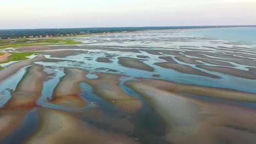 Cape Cod Bay Aerial Drone Footage of Beach at Low Tide with People Walking, Sand Bars and Puddles Du