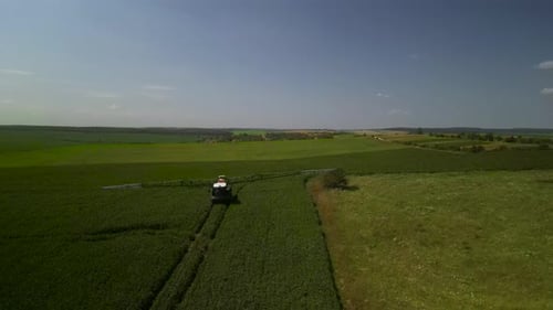 Spray Fertilize On Field With Chemicals In Agriculture Field