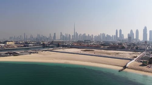 Aerial view of Jumeirah Beach with Dubai skyline in the background, UAE