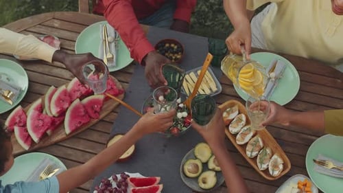 Friends Gather for a Summer Picnic Outdoors