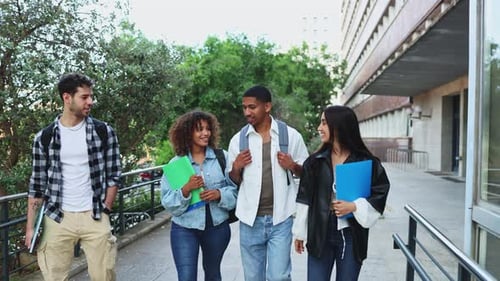 Students Walking on Campus on a Sunny Day